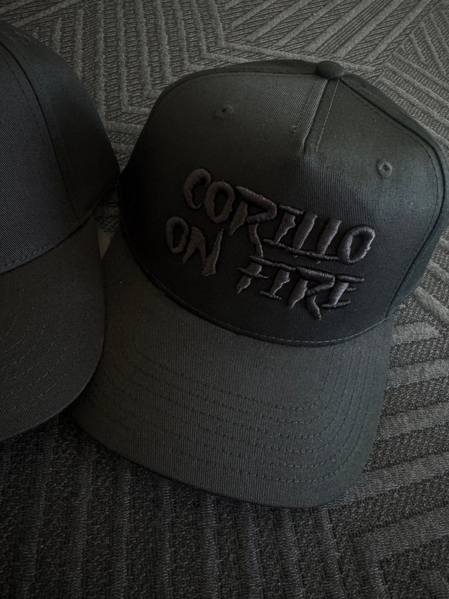 "Corillo on Fire" caps black